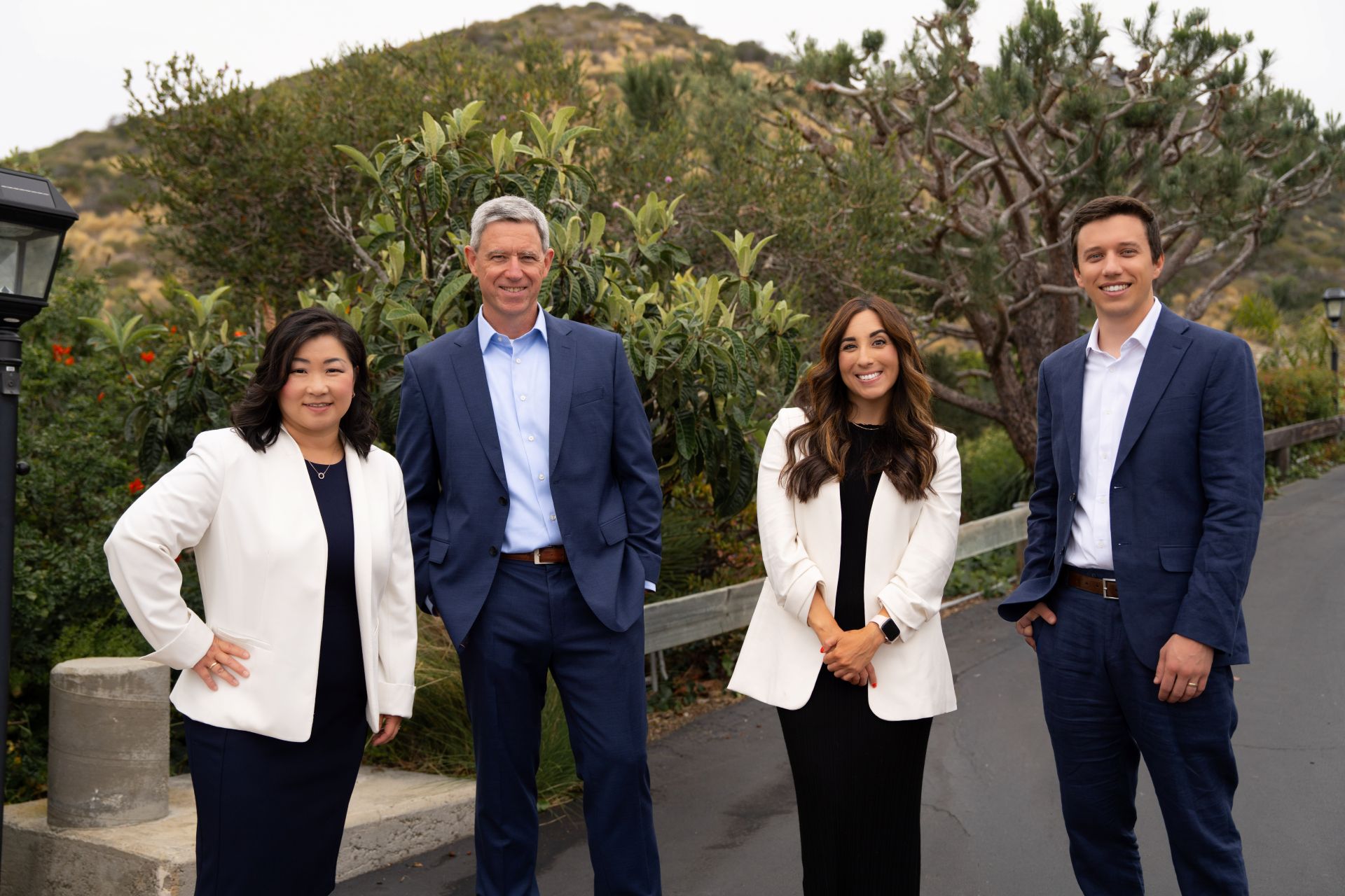 The Three Points Wealth Planners Team, posing near their offices in Dana Point, where they serve you better with three important wealth points; family, legacy, retirement